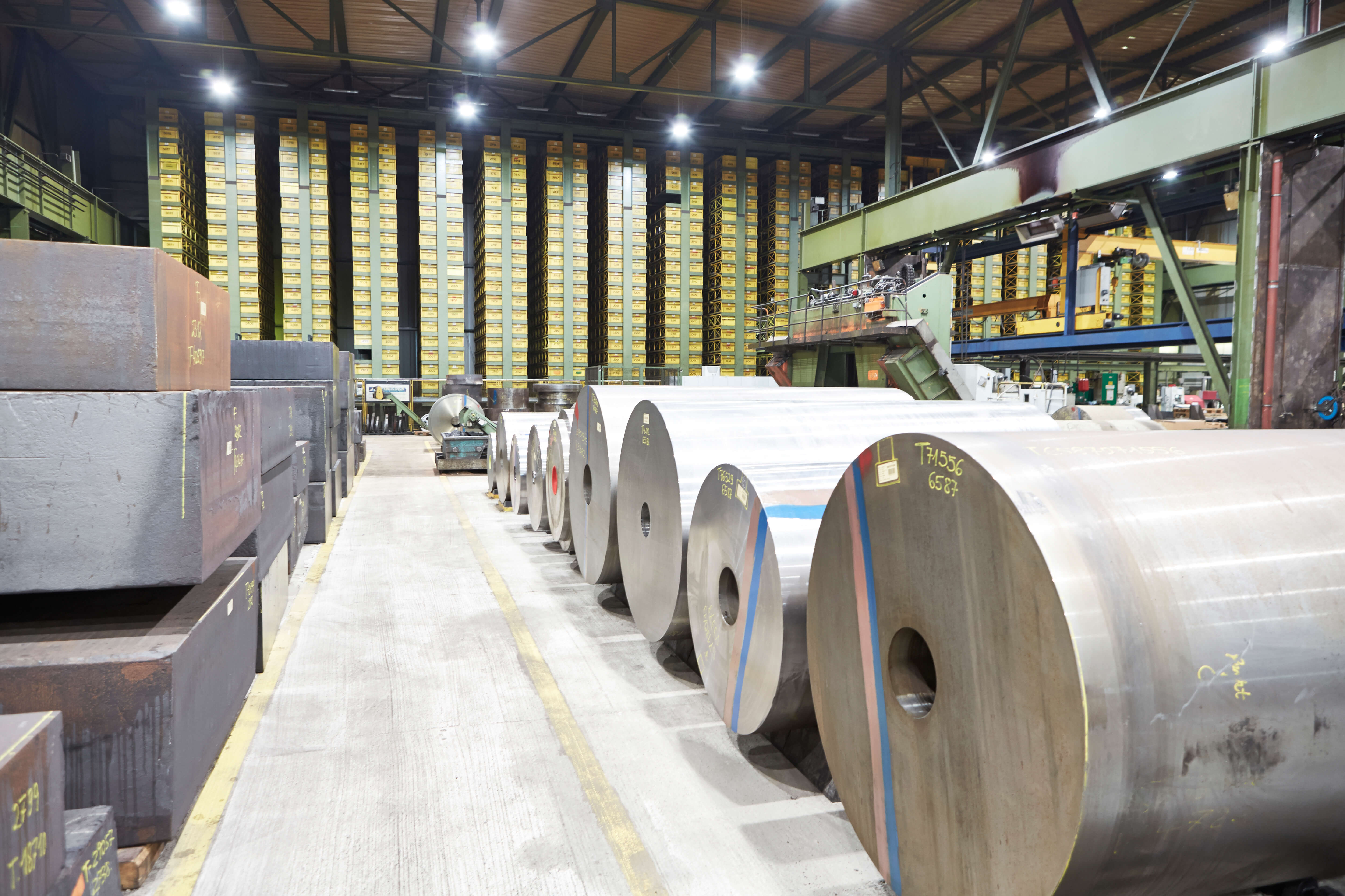 rolls of engineering steel stored in a production facility